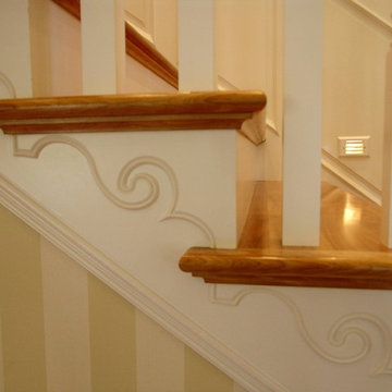 Traditional stair with painted wainscoting
