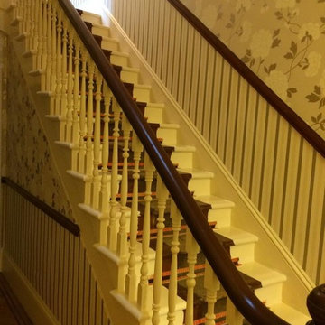 Traditional wallpaper installed on staircase