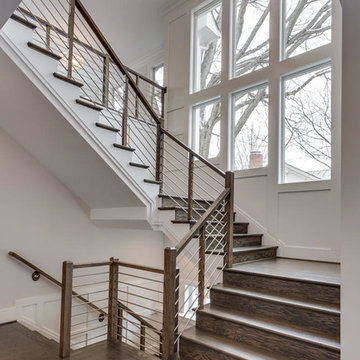 Transitional Staircase with mixed railing