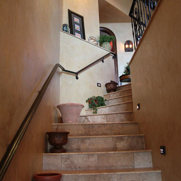 Travertine Staircase with Venetian Plaster Walls
