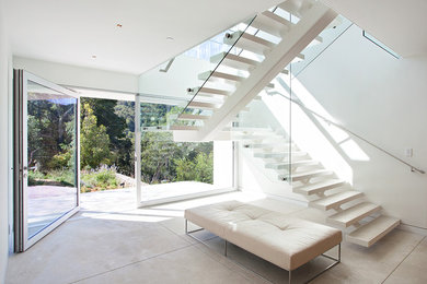 Example of a minimalist u-shaped open staircase design in San Francisco