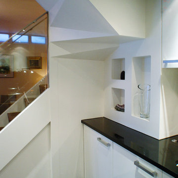 under stair display alcoves and storage area.