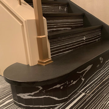 Unique black patterned porcelain floor and staircase