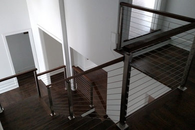 Inspiration for a mid-sized contemporary u-shaped staircase remodel in Atlanta
