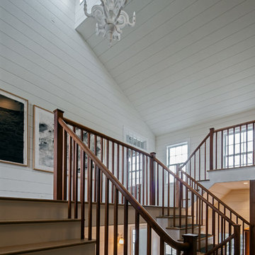Vintage barn frame addition to Dutch stone house