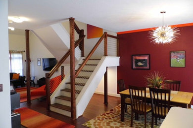 Mid-sized trendy wooden u-shaped staircase photo in Other with painted risers