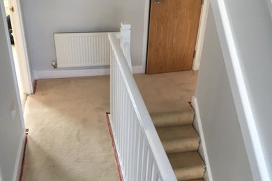 Wall painted blue & fitted carpet installed