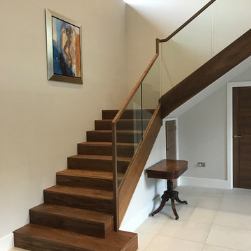 Walnut Staircase with Structural Glass