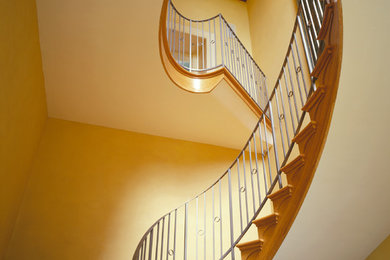 Photo of a large traditional staircase in London.
