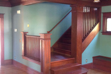 Design ideas for a large traditional l-shaped staircase in Portland.