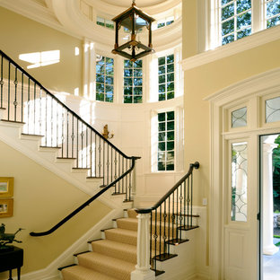 Elegant wooden u-shaped staircase photo in Boston