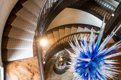 Inspiration for a rustic wooden spiral staircase remodel in Denver with wooden risers