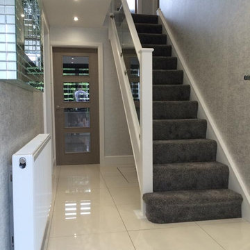 White and Glass Staircase Renovation
