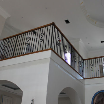 White Oak Curved Stair With European Iron Balusters