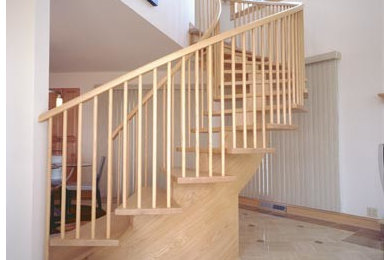 White Oak Mono-Stringer Curved Stairs with Open Ends