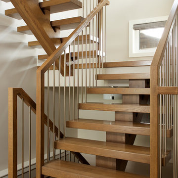 white oak mono stringer with stainless steel spindles