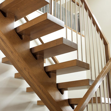 white oak mono stringer with stainless steel spindles