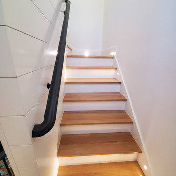 White oak stairs with dark rails inside, Ultralox aluminum rails outside