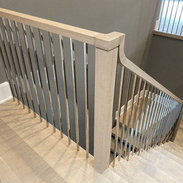 White Oak Stairs with Polished Stainless Steel Balusters