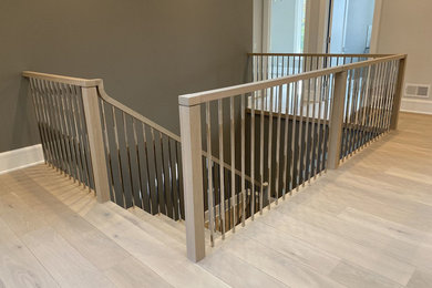 Staircase - wooden u-shaped mixed material railing staircase idea in Chicago