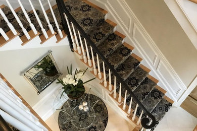 Inspiration for a large timeless wooden l-shaped wood railing staircase remodel in Boston with painted risers