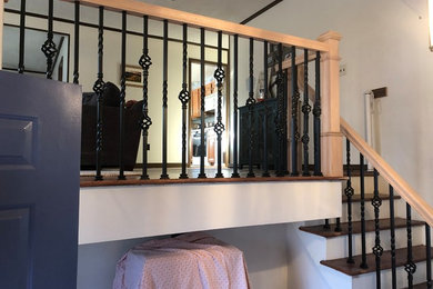Staircase - small wooden l-shaped mixed material railing staircase idea in Tampa with wooden risers