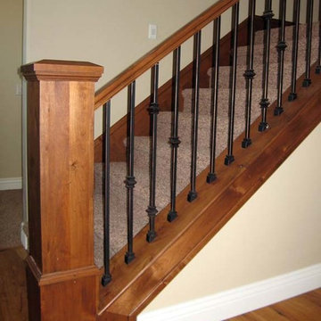 Wood Railing with Wrought Iron Balusters