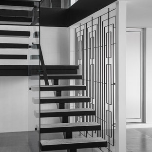 Design ideas for an u-shaped staircase in Sydney with open risers.