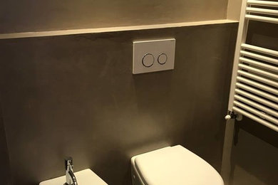Esempio di un bagno di servizio minimalista