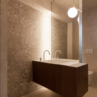 Esempio di una grande stanza da bagno minimalista con pavimento grigio