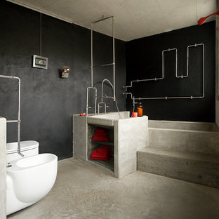 Esempio di una stanza da bagno eclettica con nessun'anta e top in cemento