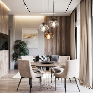 Foto de comedor contemporáneo, pequeño, con paredes grises, suelo de madera en tonos medios y suelo beige