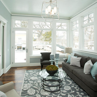 Inspiration for a mid-sized transitional dark wood floor and brown floor sunroom remodel in Minneapolis with no fireplace