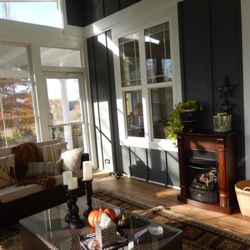 A Gas Log Fireplace Creates Added Warmth on Your Eze Breeze Window Room Addition