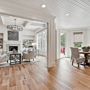 Inspiration for a craftsman light wood floor sunroom remodel in Other