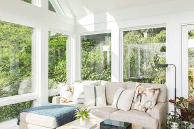 Example of a transitional sunroom design in Raleigh