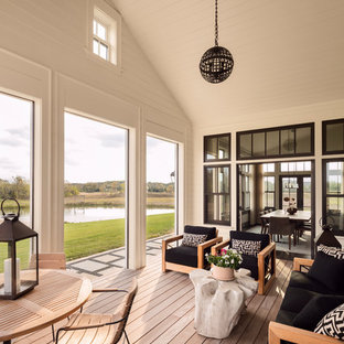 Inspiration for a contemporary light wood floor and beige floor sunroom remodel in Milwaukee