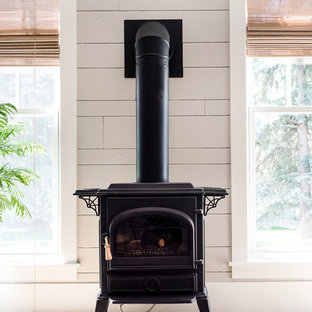 Example of an arts and crafts sunroom design in Denver