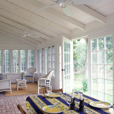 Country brick floor and red floor sunroom photo in New York with a standard ceiling