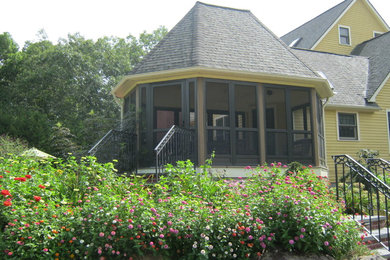 Photo of a modern conservatory in Providence.