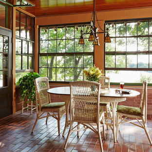 Inspiration for a mid-sized craftsman brick floor and red floor sunroom remodel in Minneapolis with no fireplace and a standard ceiling