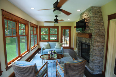 Example of an arts and crafts sunroom design in Minneapolis