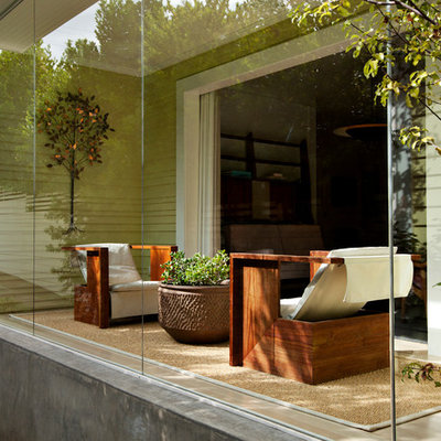 Inspiration for a modern sunroom remodel in Los Angeles with a standard ceiling