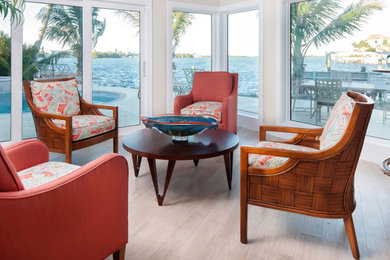 Sunroom - mid-sized tropical porcelain tile and gray floor sunroom idea in Tampa