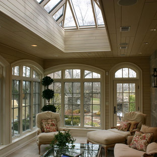 Sunroom - mid-sized traditional limestone floor and beige floor sunroom idea in Chicago with no fireplace and a skylight