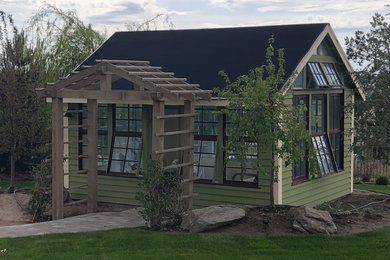 Example of an arts and crafts sunroom design in Boise