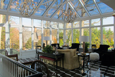 Photo of an expansive contemporary conservatory in DC Metro with no fireplace and a glass ceiling.