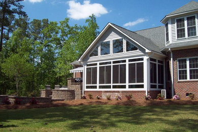 Example of an arts and crafts sunroom design in Other