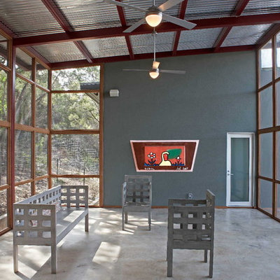Inspiration for a huge modern concrete floor and gray floor sunroom remodel in Austin with a standard ceiling and no fireplace