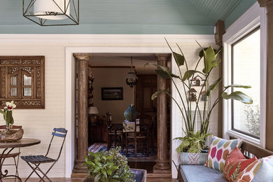 Inspiration for a mid-sized tropical terra-cotta tile sunroom remodel in Charlotte with no fireplace and a standard ceiling